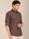 Men’s cocoa brown leaf print shirt styled with beige trousers angle-1