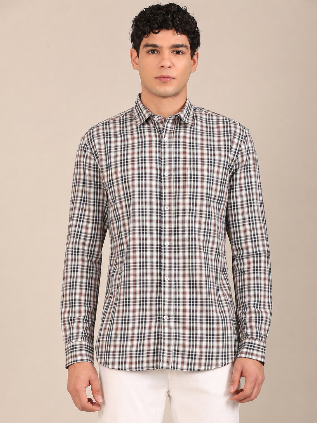 Model styling a men’s navy brown check shirt -Front