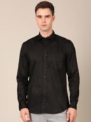 Model wearing a black satin shirt for men front