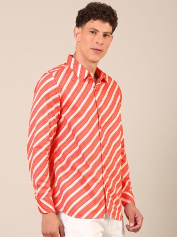 Model wearing a coral red striped cotton shirt for men side2