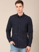 Model wearing a blue striped regular fit shirt for men front