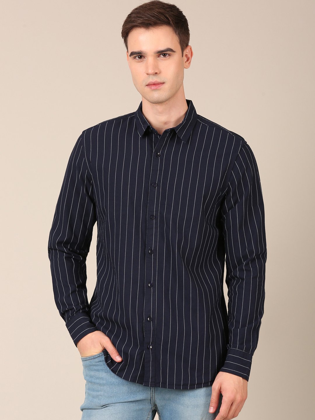 Model wearing a blue striped regular fit shirt for men front