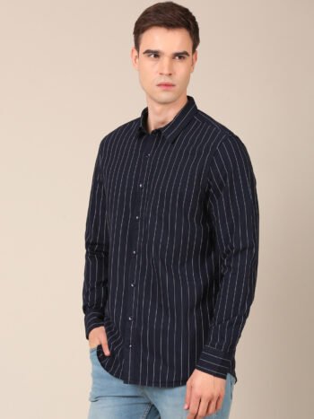 Model wearing a blue striped regular fit shirt for men side2