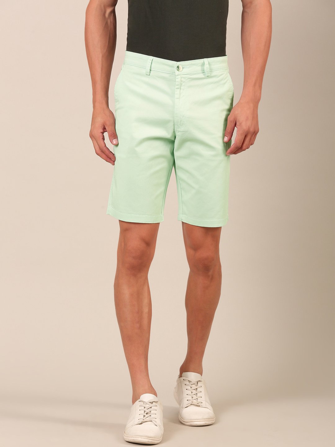 Model wearing Sea Mist Smart Fit shorts for front